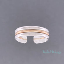 Load image into Gallery viewer, toe ring with two bands of silver with a gold band center floating over a grey background.